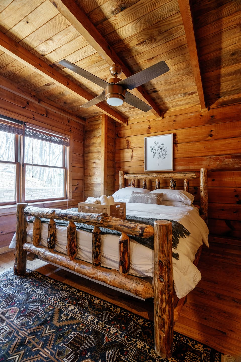 mainfloor bedroom (queen); This bedroom also has large Roku Smart TV