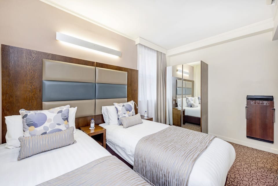 Standard Room, 2 Twin Beds | In-room safe, desk, laptop workspace, blackout drapes