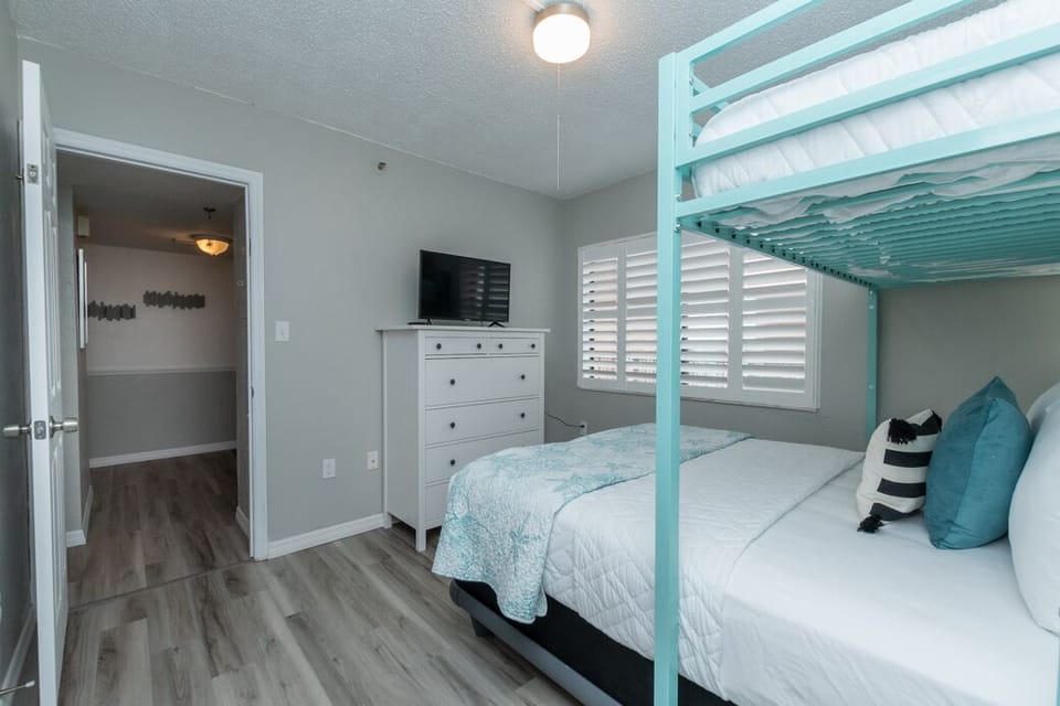 Second Bedroom: Smart TV, Dresser and Walk-In Closet.