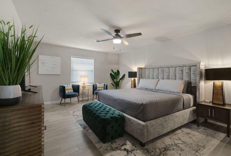 King bed with quality linens for a comfortable night's sleep. 