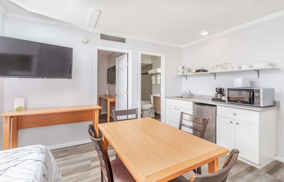 Superior Suite, 2 Queen Beds, Accessible, Courtyard View | Living area | 43-inch LED TV with digital channels, TV, pay movies