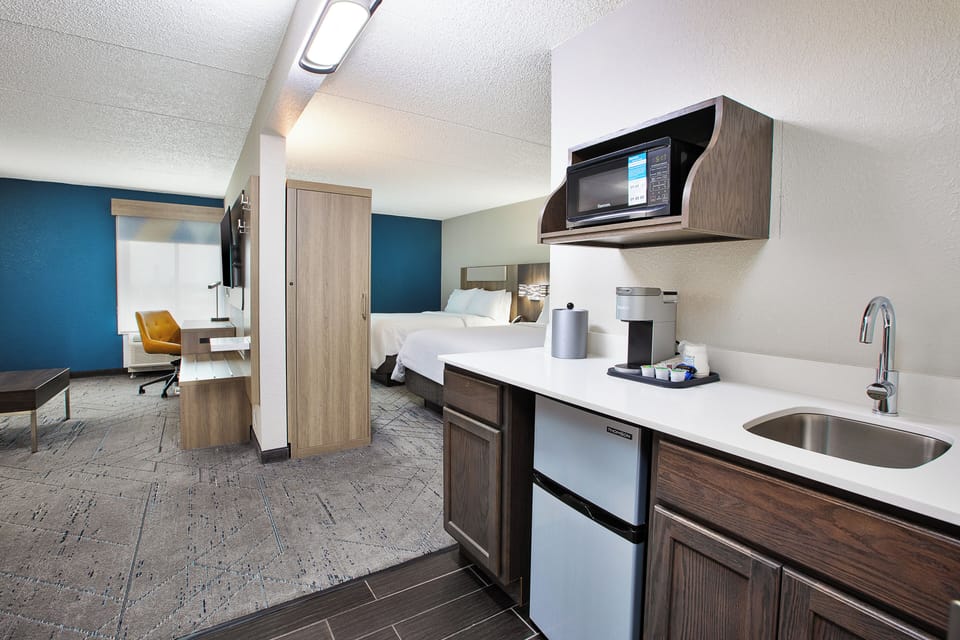Suite, 2 Queen Beds | Premium bedding, in-room safe, desk, laptop workspace