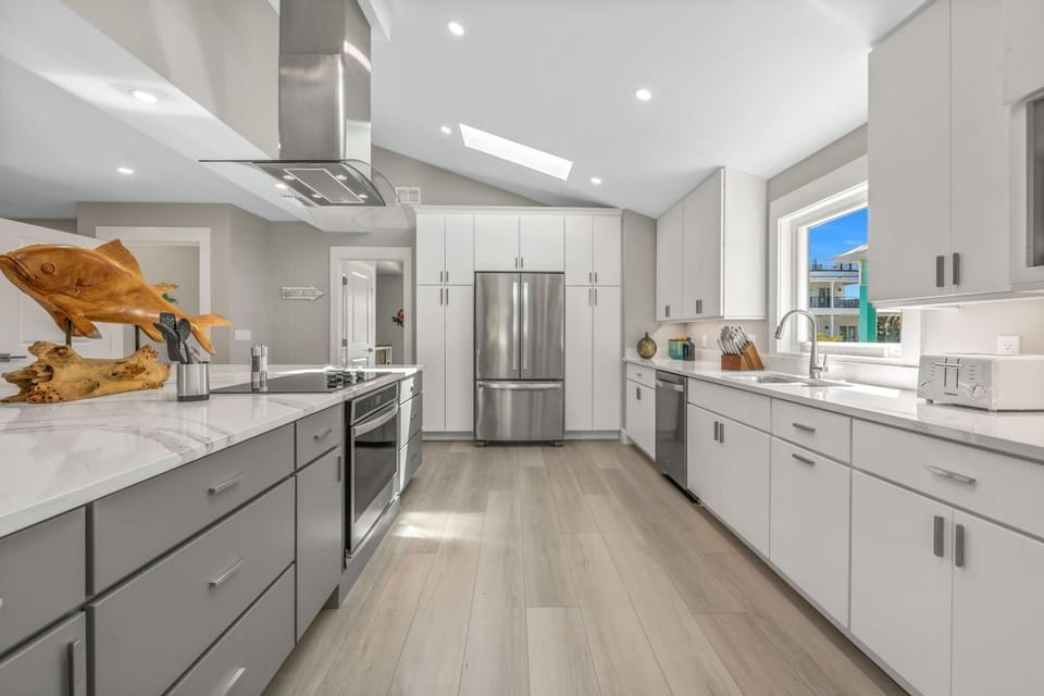 Large modern open kitchen area with a large island