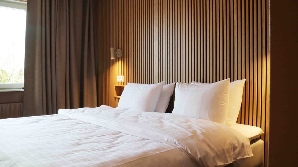 Hypo-allergenic bedding, blackout drapes, soundproofing