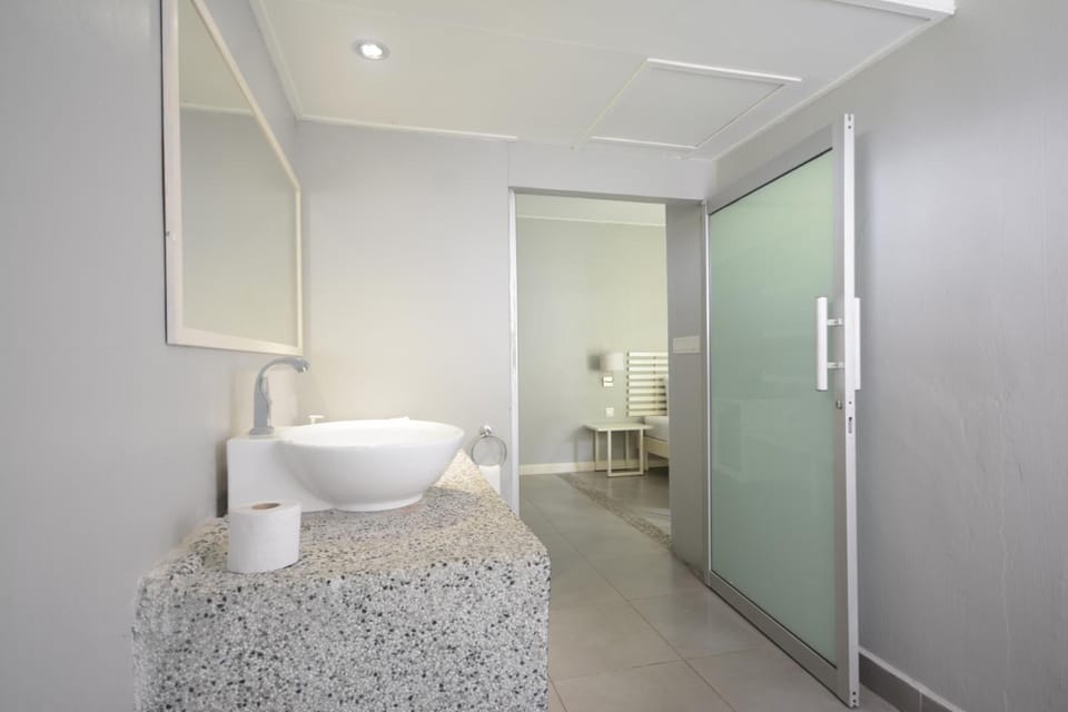 Shower, free toiletries, hair dryer, slippers