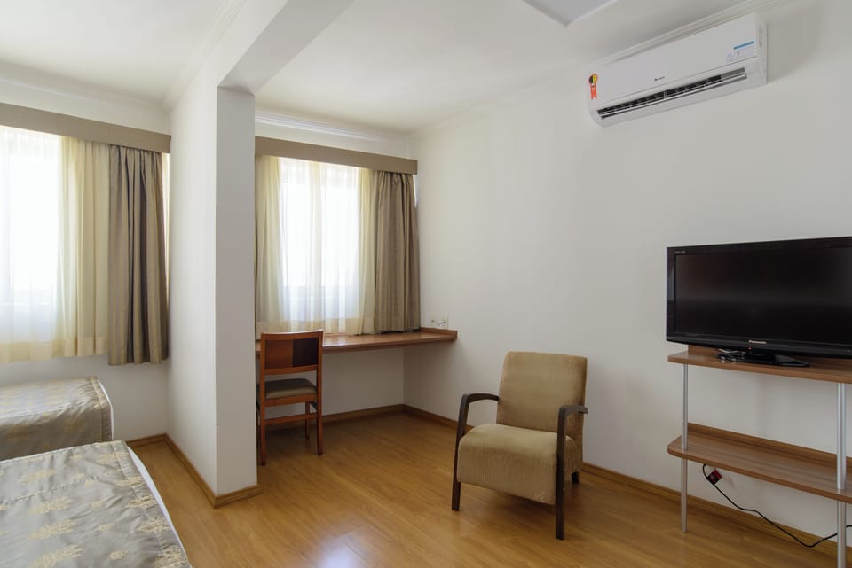 Superior Triple Room | Minibar, desk, blackout drapes, free WiFi