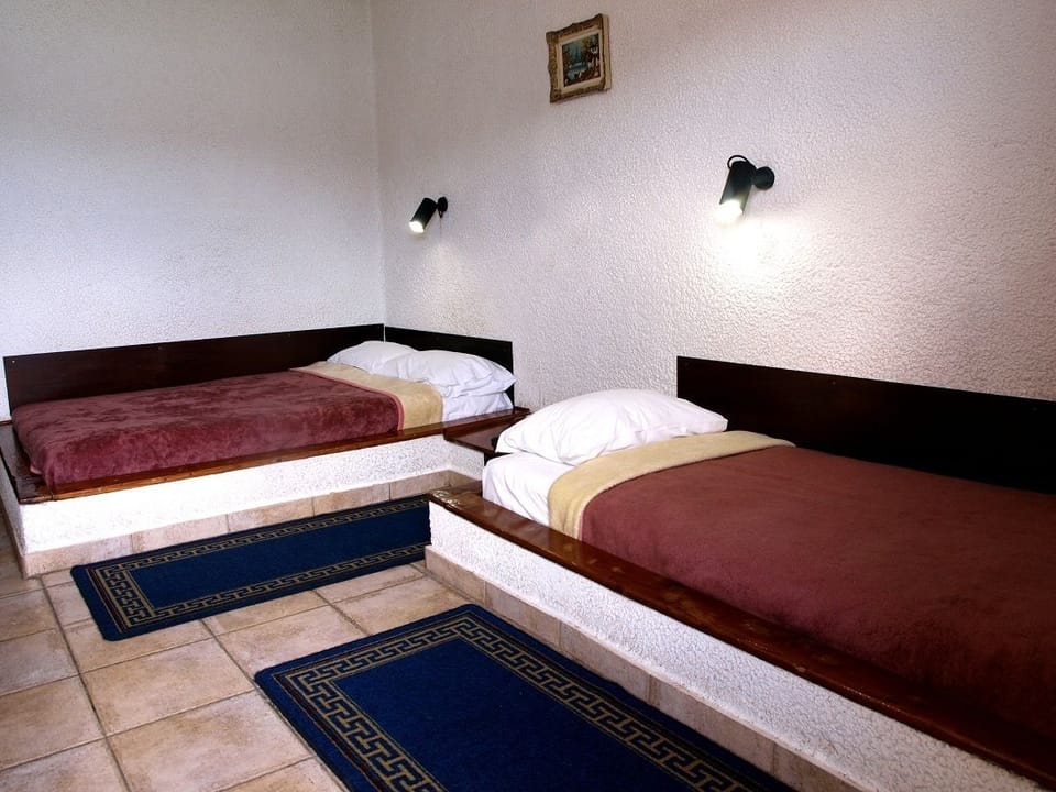 Basic Double Room | In-room safe, iron/ironing board, free cribs/infant beds, free WiFi