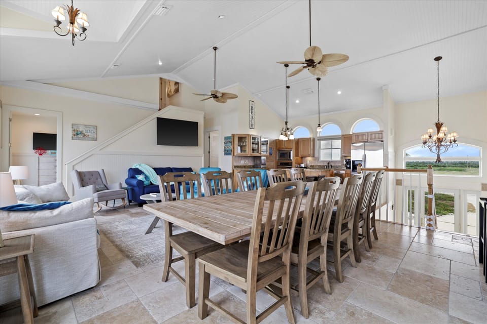 Large dining table seats 12. Kitchen Island w/ seating for another 6 people.