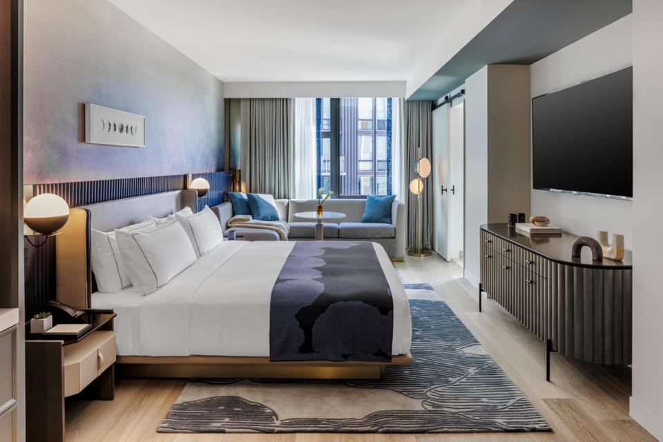Premium bedding, down comforters, in-room safe, desk