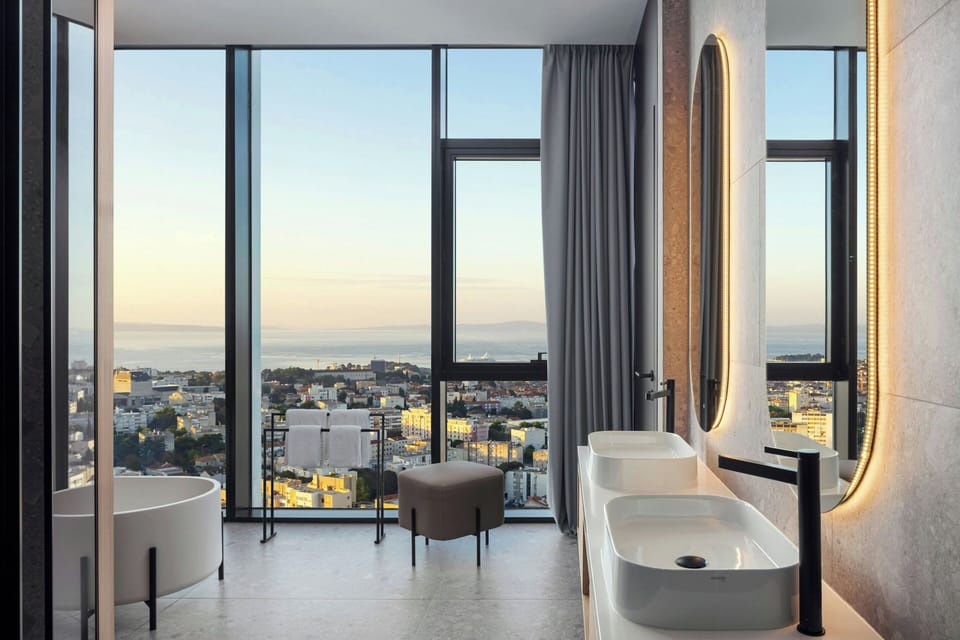 Rainfall showerhead, designer toiletries, hair dryer, bathrobes