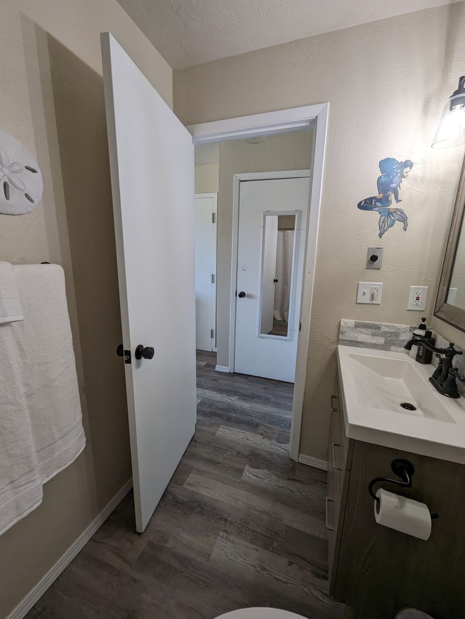 Second full bath in bedroom has water saving toilet, tub/shower combo