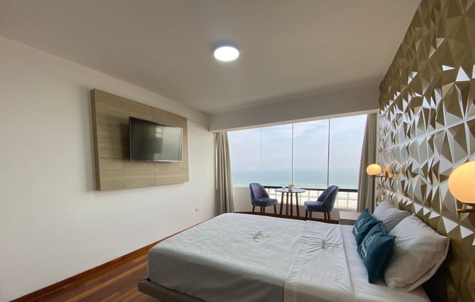 Deluxe Double Room, 1 Queen Bed, Beach View | Down comforters, in-room safe, WiFi (free), bed sheets