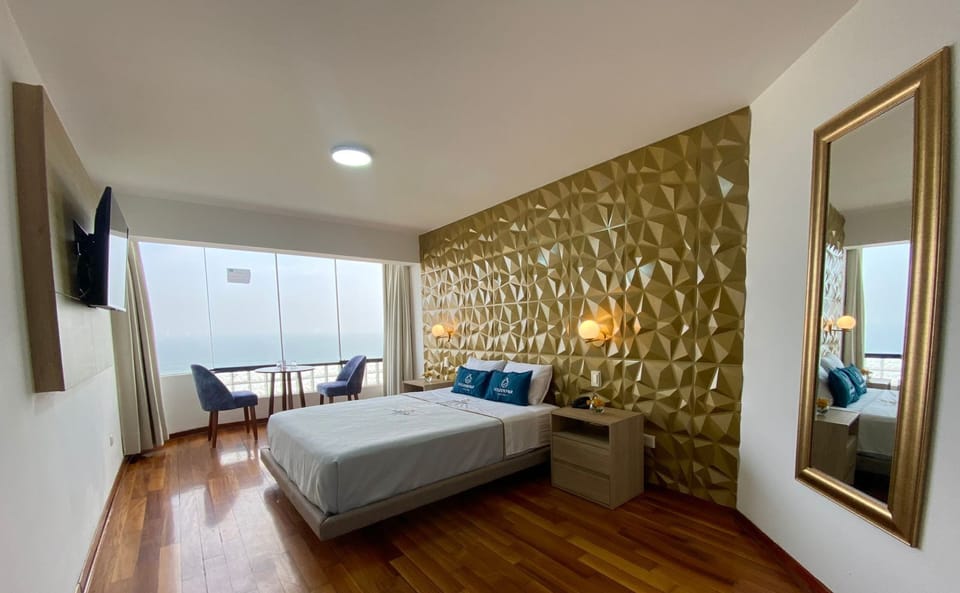 Deluxe Double Room, 1 Queen Bed, Beach View | Down comforters, in-room safe, WiFi (free), bed sheets