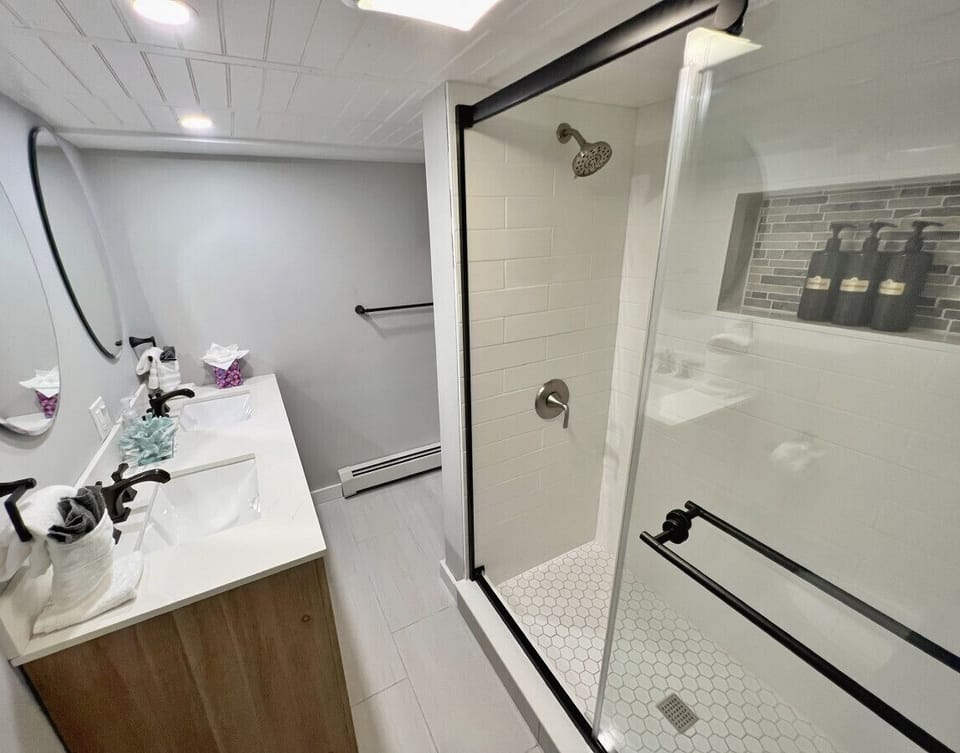 Refresh and recharge in this beautifully updated bathroom with contemporary amenities.