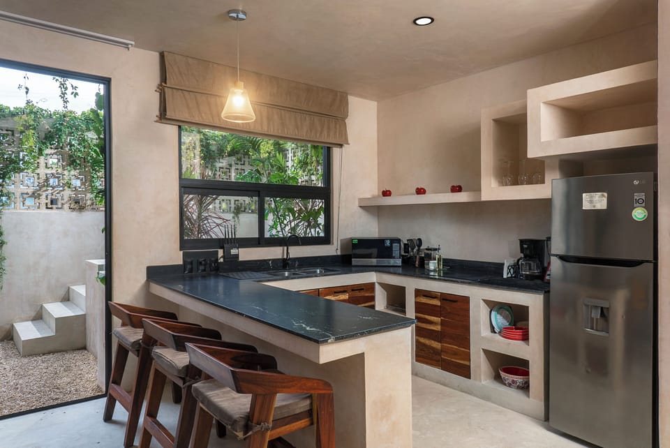 Luxury Apartment, 1 Queen Bed, Garden Area | Private kitchen | Full-size fridge, microwave, stovetop, coffee/tea maker