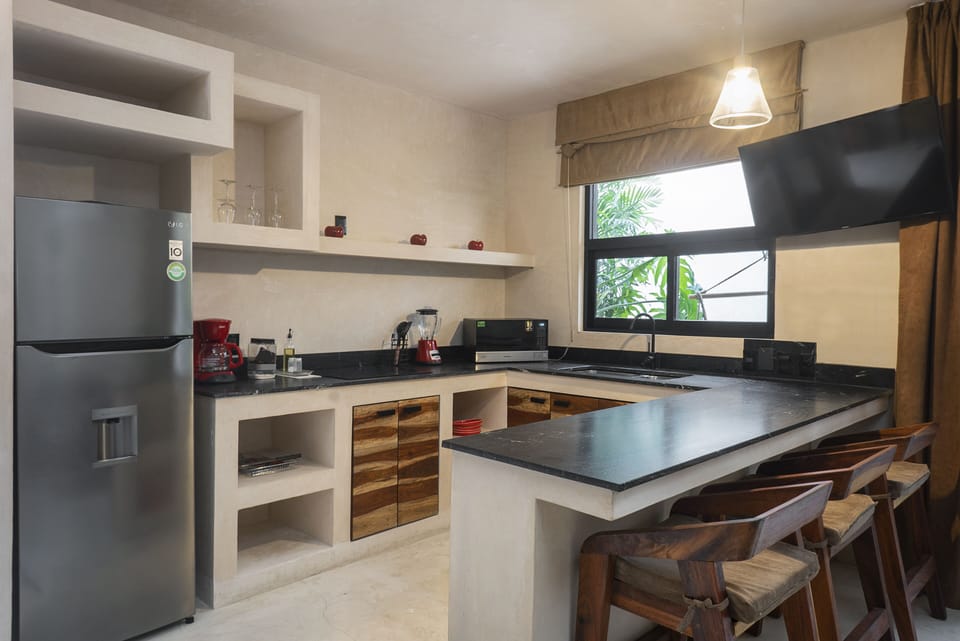 Honeymoon Apartment, 1 Queen Bed, Garden Area | Private kitchen | Full-size fridge, microwave, stovetop, coffee/tea maker