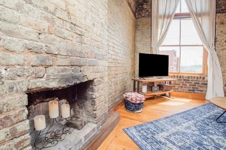 Netflix and chill by a remote-operated candle-lit fireplace.