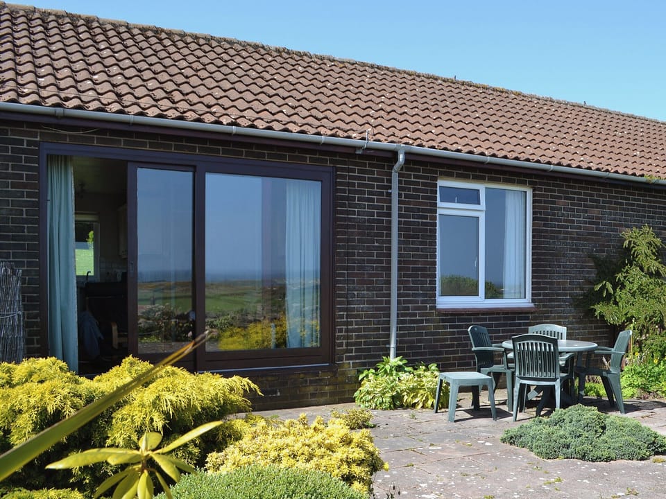 Sitting-out-area | Eider Cottage, Embleton