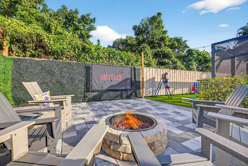 While kids enjoy games like cornhole, adults can relax by the cozy fire pit or gather for an outdoor movie night, creating the perfect balance of fun and relaxation for everyone.