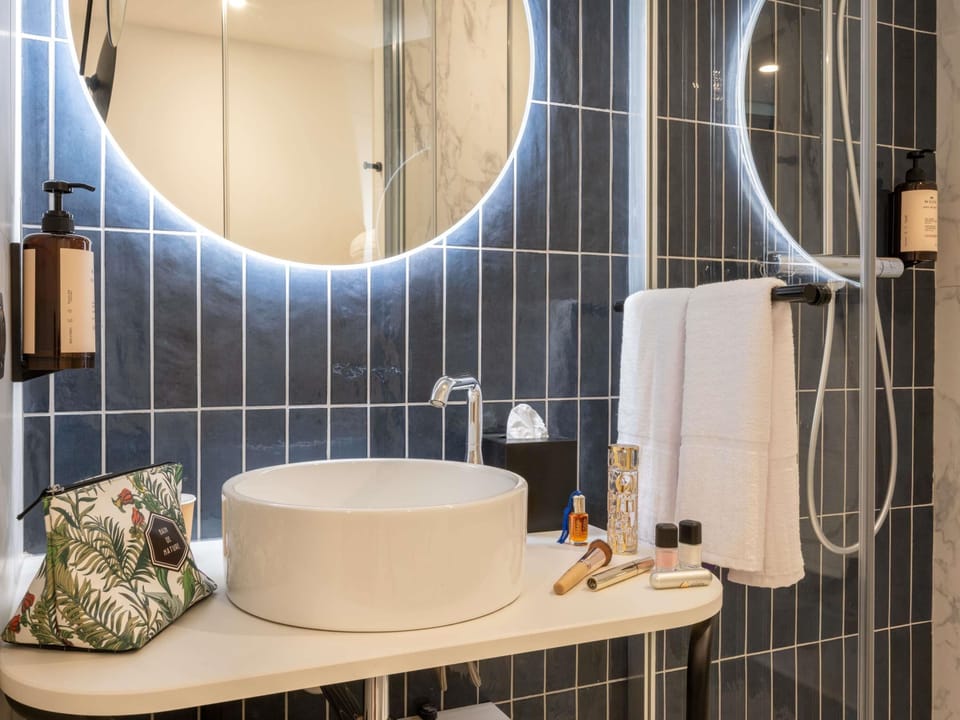 Eco-friendly toiletries, hair dryer, towels, soap