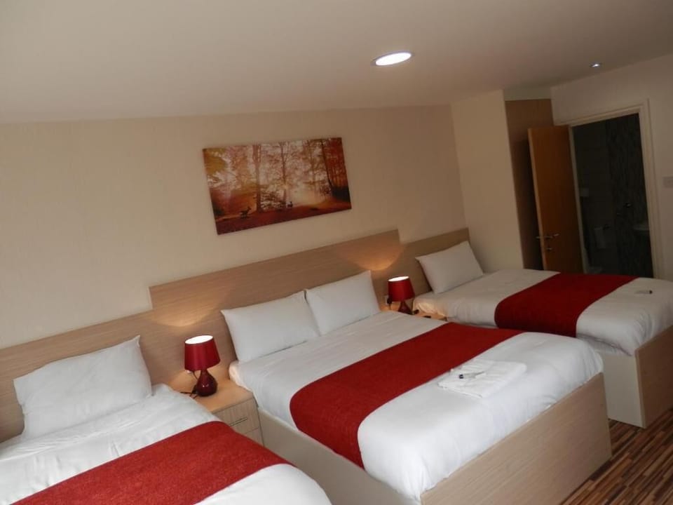 Standard Suite, Private Bathroom | Individually furnished, desk, laptop workspace, free WiFi