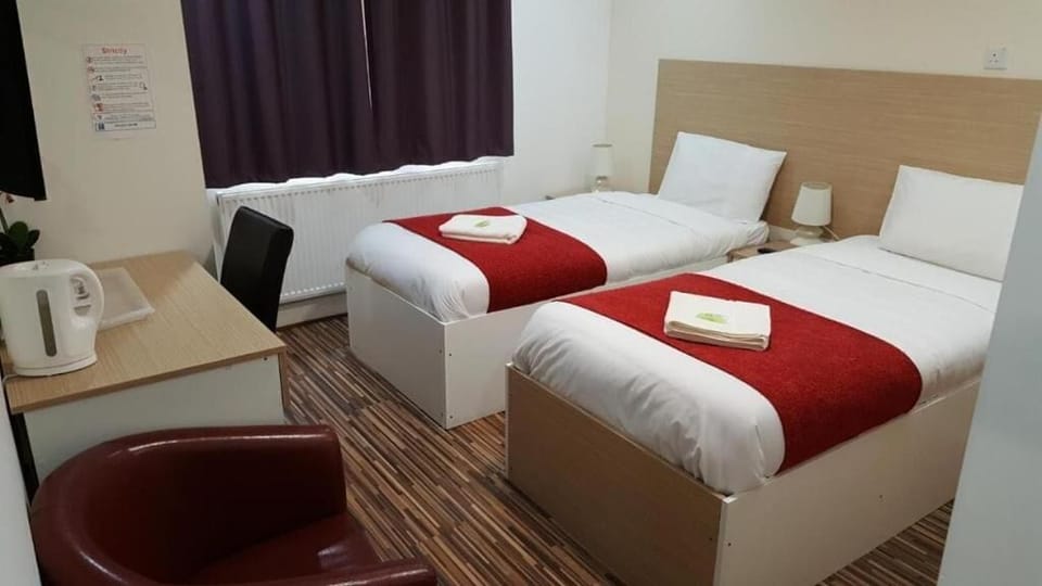 Basic Double or Twin Room, Private Bathroom | Individually furnished, desk, laptop workspace, free WiFi