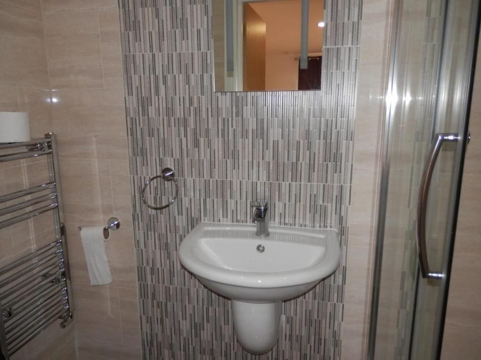 Shower, rainfall showerhead, hair dryer, towels