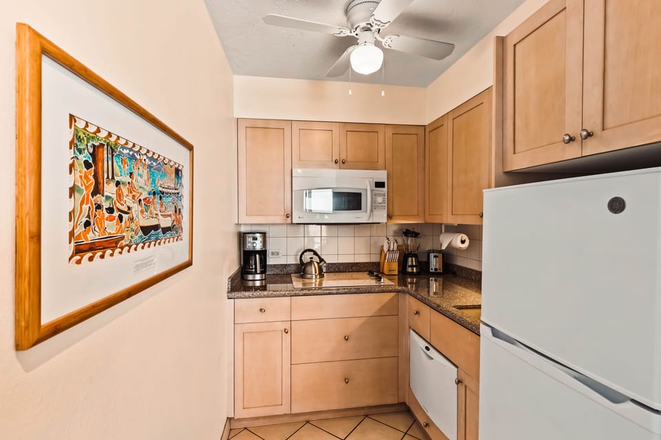 Drip coffee maker, toaster, kettle, and other essential dishware and utensils provided