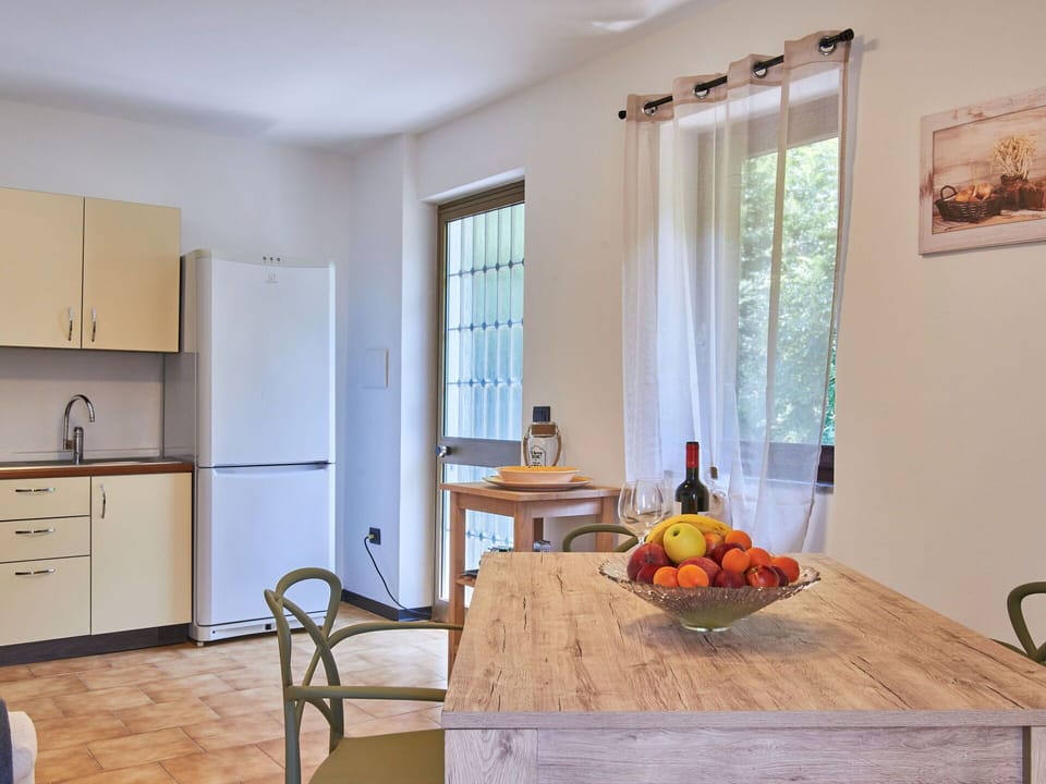 Food, Table, Property, Furniture, Cabinetry, Window, Countertop, Wood, Interior Design, Flooring