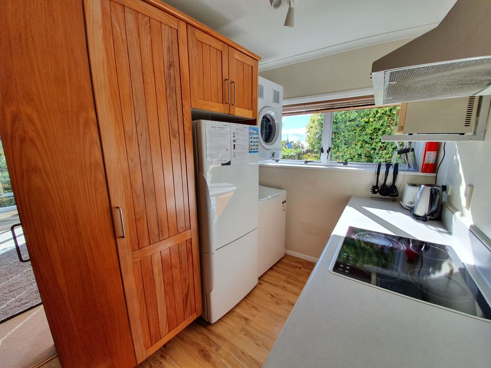 Apartment 1 - Laundry area in kitchen