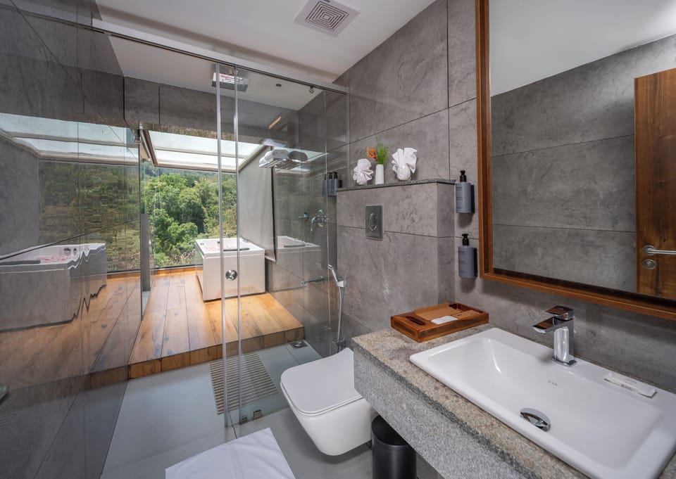 Garden Cascade Villa | Bathroom | Shower, rainfall showerhead, free toiletries, hair dryer