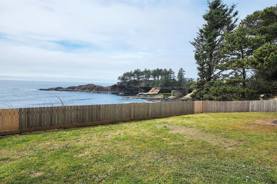 Large grassy yard for outdoor family fun.