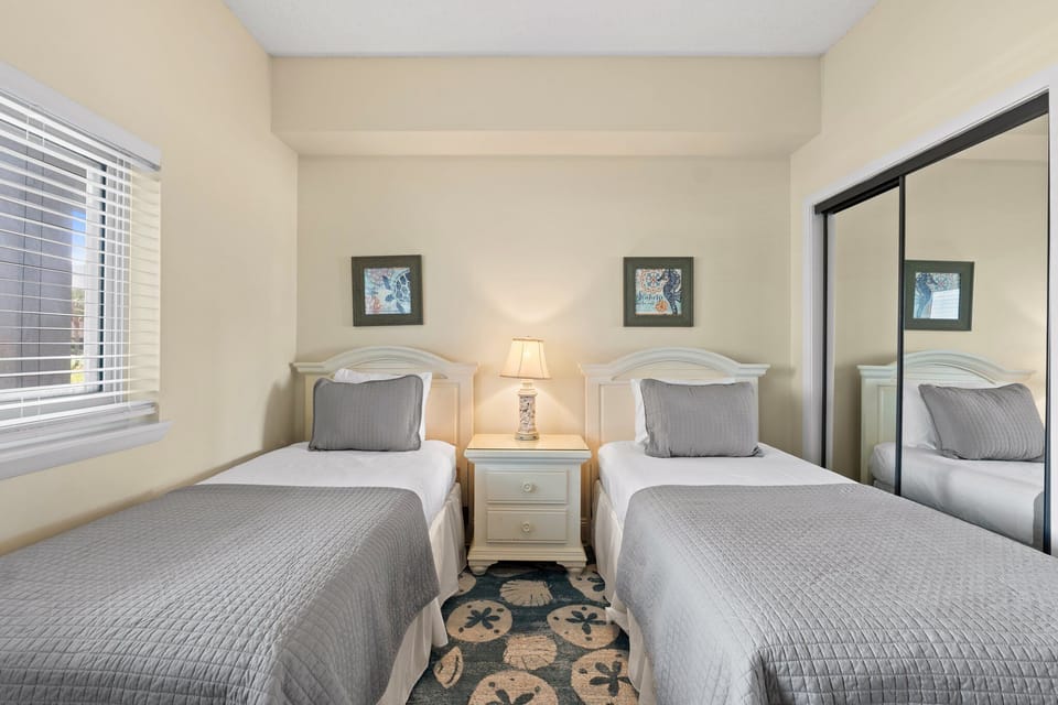 2nd bedroom showing full size closet for unpacking and storage and your private entry into the guest bath.