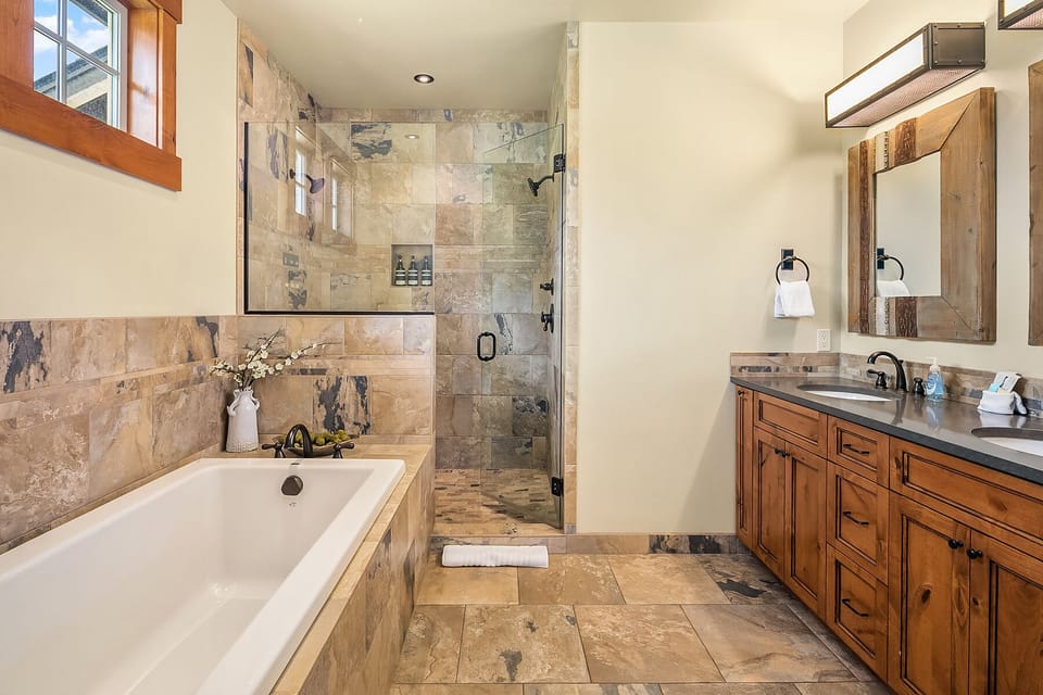 Elk Grove: - Master tile bath with a large soaking tub and tile shower.