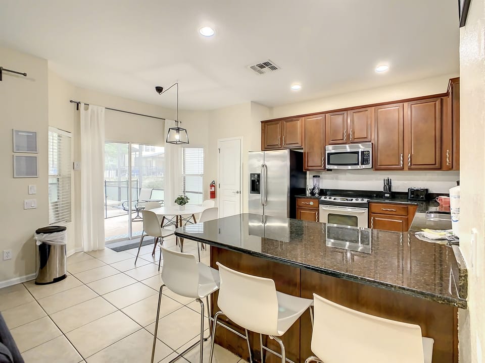 3 bar stools to socialize with the chef