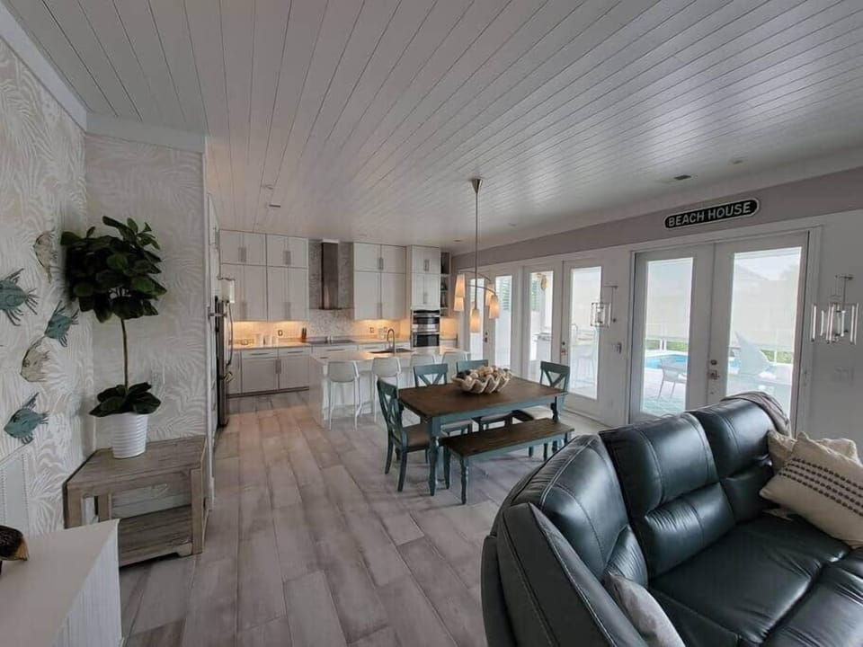 Small dining area with extra seating at the kitchen countertop.  