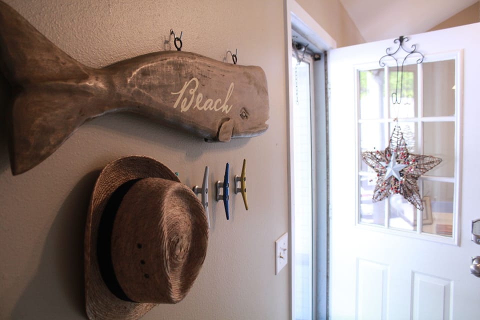 Hang your hat, bag, coat, beach towel right near the front door!