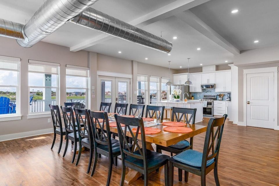 Open Floor Plan with living areas, dining and kitchen.