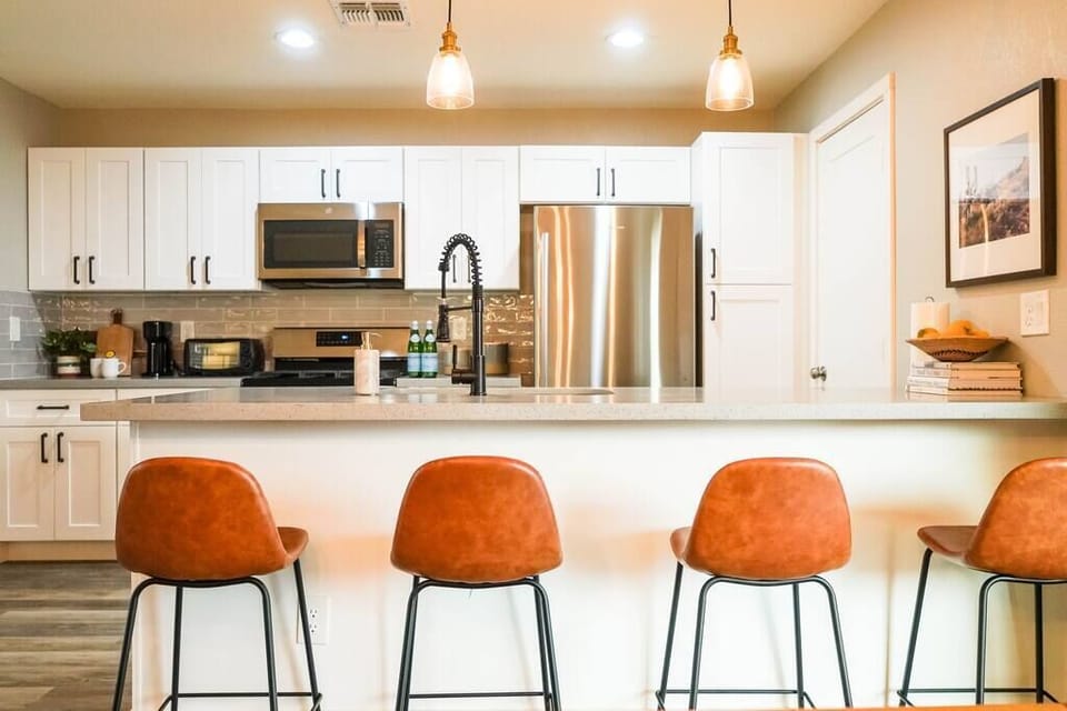 Seating for four at the breakfast bar means you'll never be too hard at work in the kitchen, you'll be too busy making memories.
