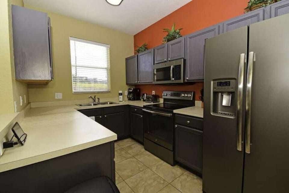 Prepare meals or snacks in the fully equipped kitchen.
