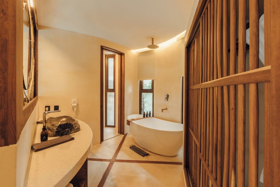Deep soaking tub, rainfall showerhead, hair dryer, bathrobes