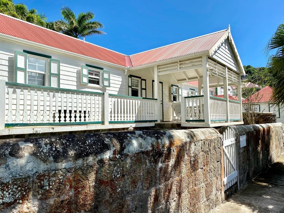 View of cottage from walkway to town.