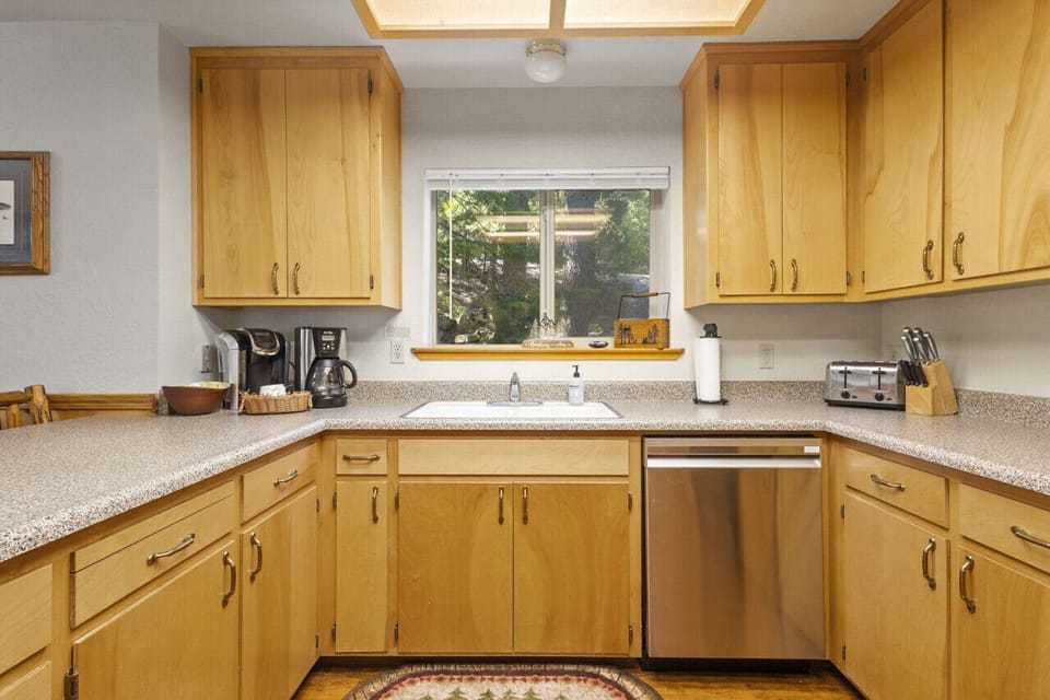 Lots of counter space and enjoy a lovely view while at the kitchen sink