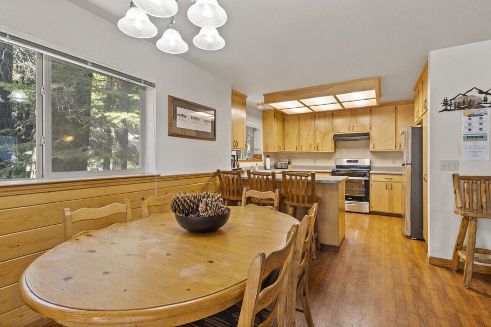 Plenty of dining space inside with a 6 person dining table and 3 spaces at the bar. Dishware & flatware provided