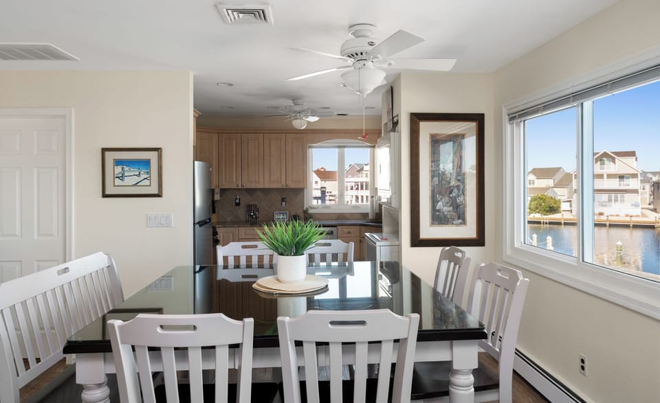Kitchen and Dining room table are totally legit!   Look at the 1/2 glass cover!