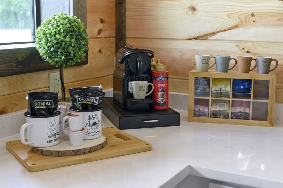 Start your mornings right with a full coffee and tea bar, including Keurig, Nespresso, and everything you need for the perfect cup.