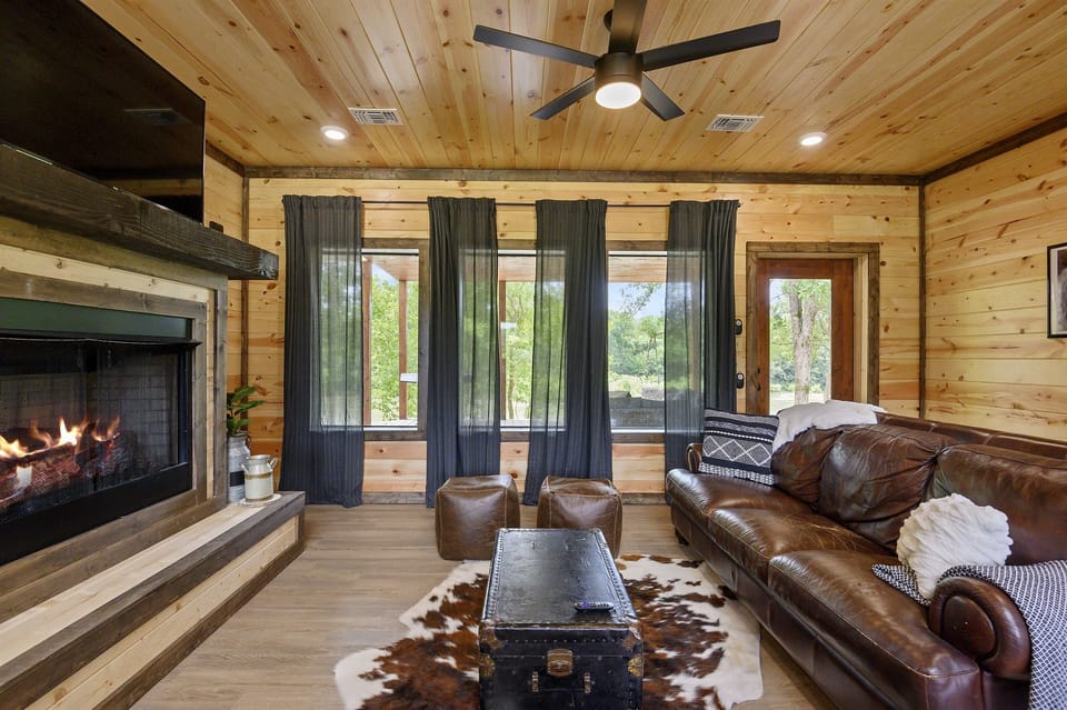 Cozy up by the indoor fireplace — ideal for movie nights or a lazy morning with coffee.