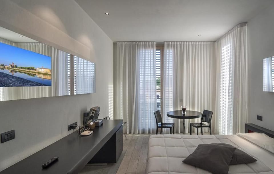 Minibar, blackout drapes, soundproofing, iron/ironing board
