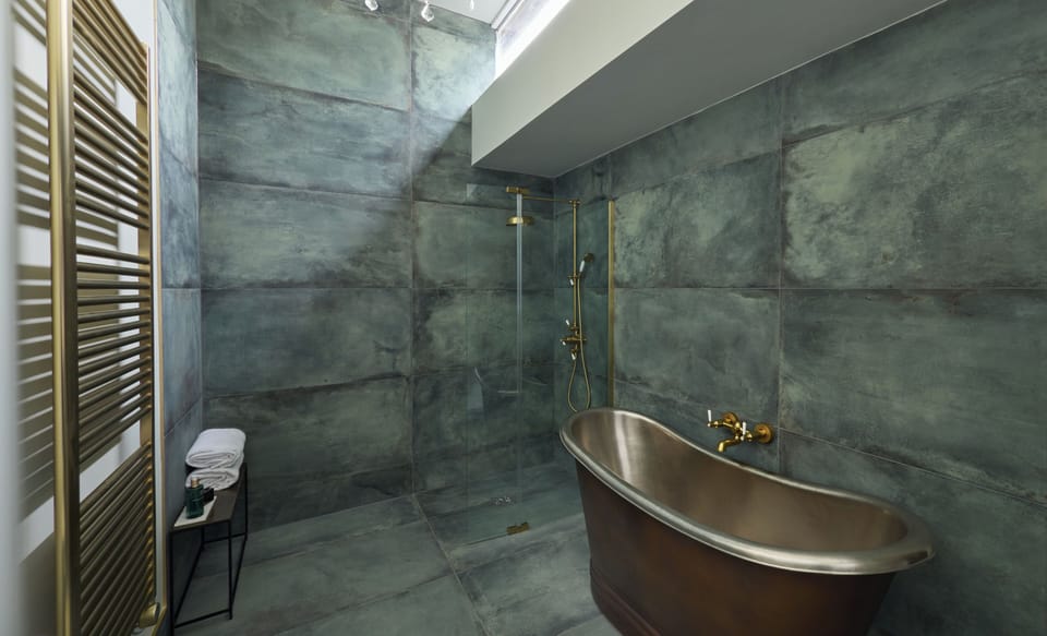 Suite | Bathroom | Designer toiletries, hair dryer, towels