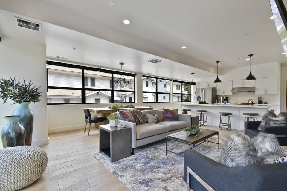 Relax in the sun-drenched, open-concept living room with activities galore. 